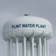 The Flint Water Plant tower hangs over the city in this February 2016 photo.